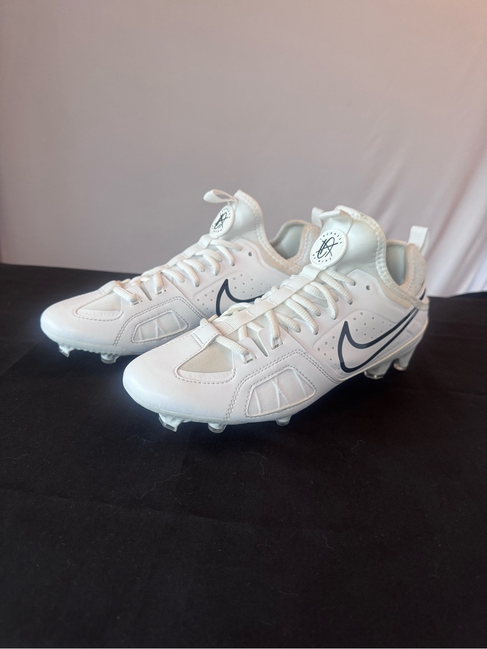Nike White Cleats men’s 9.5 with Navy Swoosh